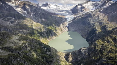 Simulationsbild: Unterhalb des Triftgletschers liegt als Simulation der Triftstausee mit einer Staumauer